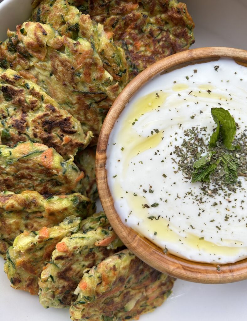 Zucchini pancakes with garlic yoghurt on the side